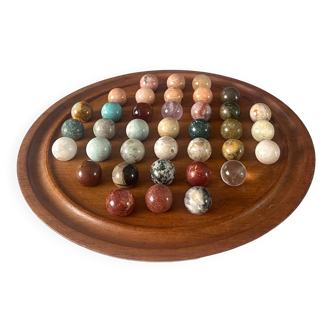 Vintage solitaire game in wood and stones