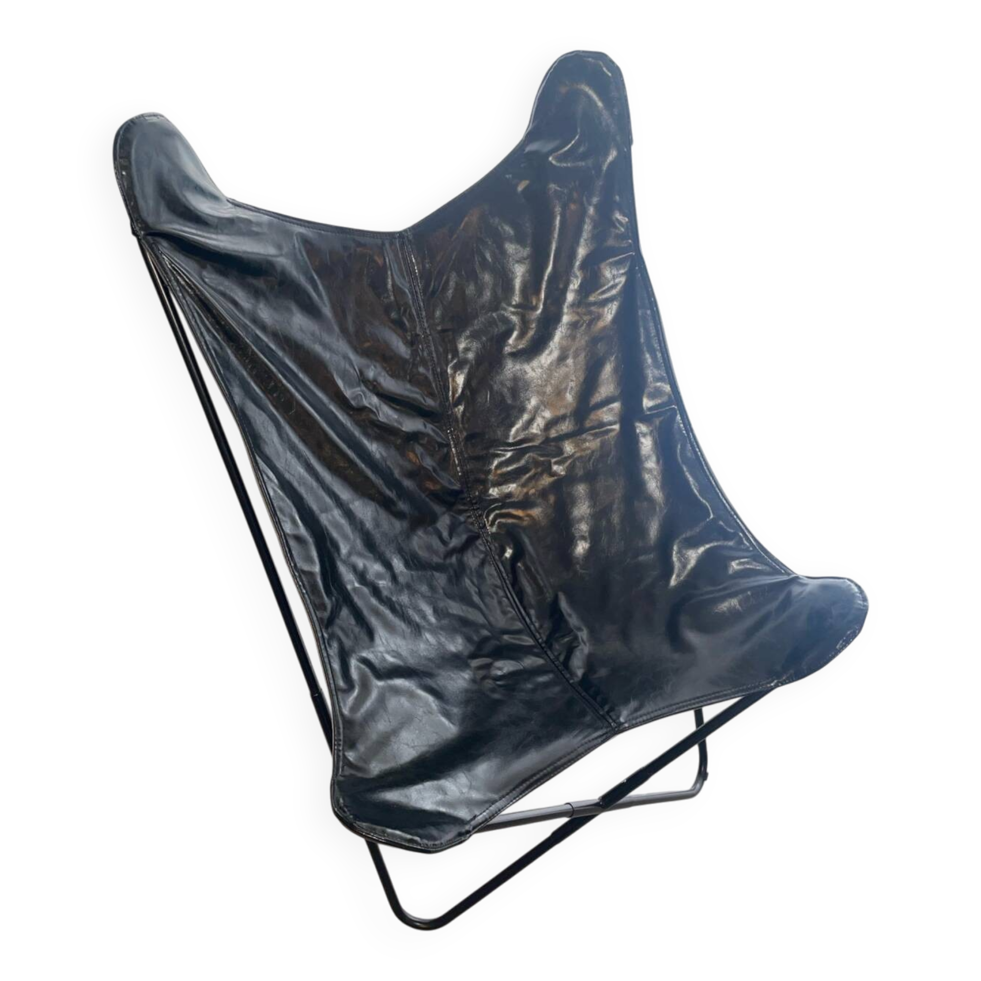 Fauteuil papillon en similicuir en parfait état