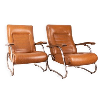 Paire de fauteuils vintage des années 1940 en acier et cuir design thonet