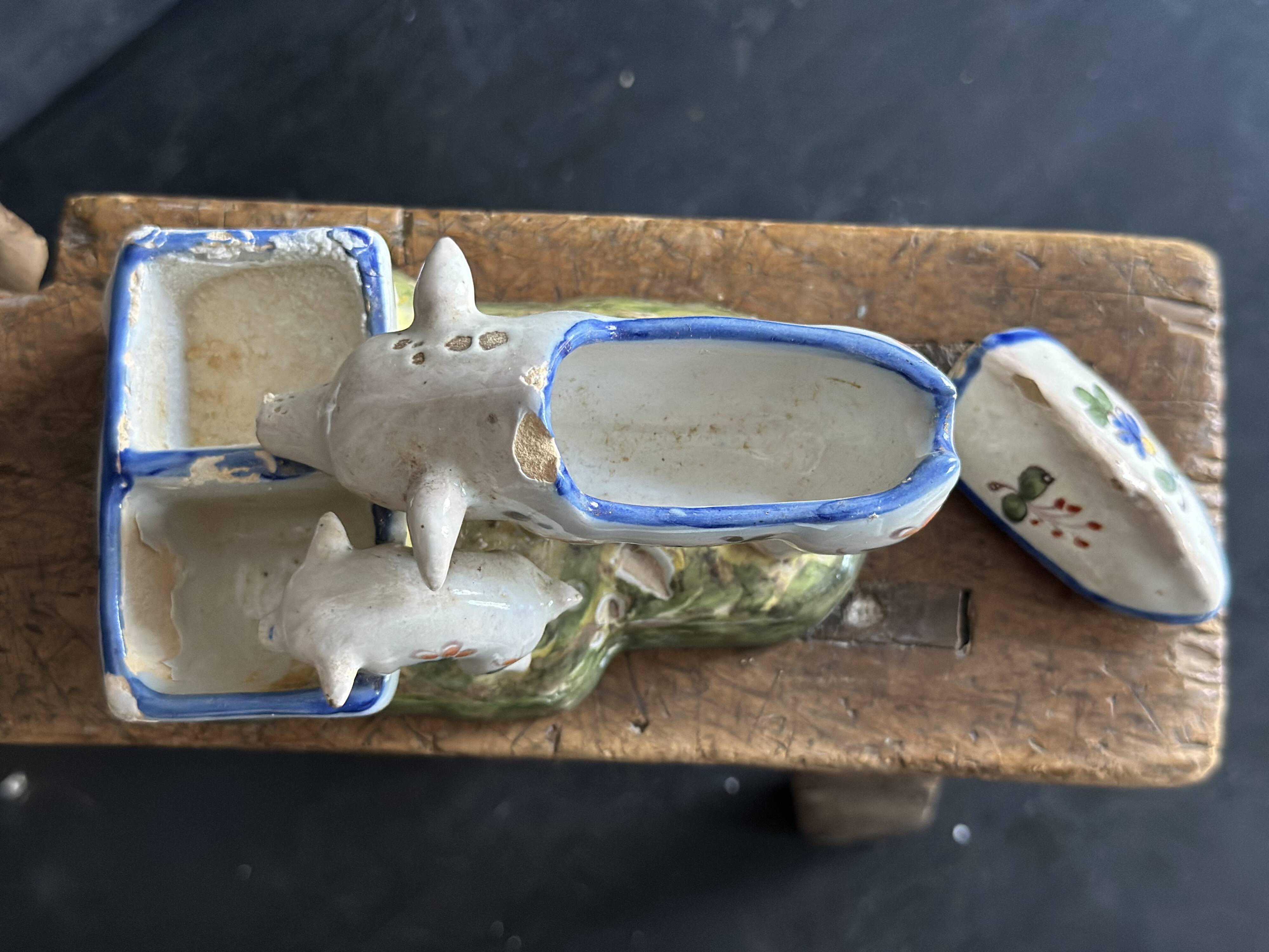 Antique earthenware pig box, salt cellar or mustard pot, floral decoration.