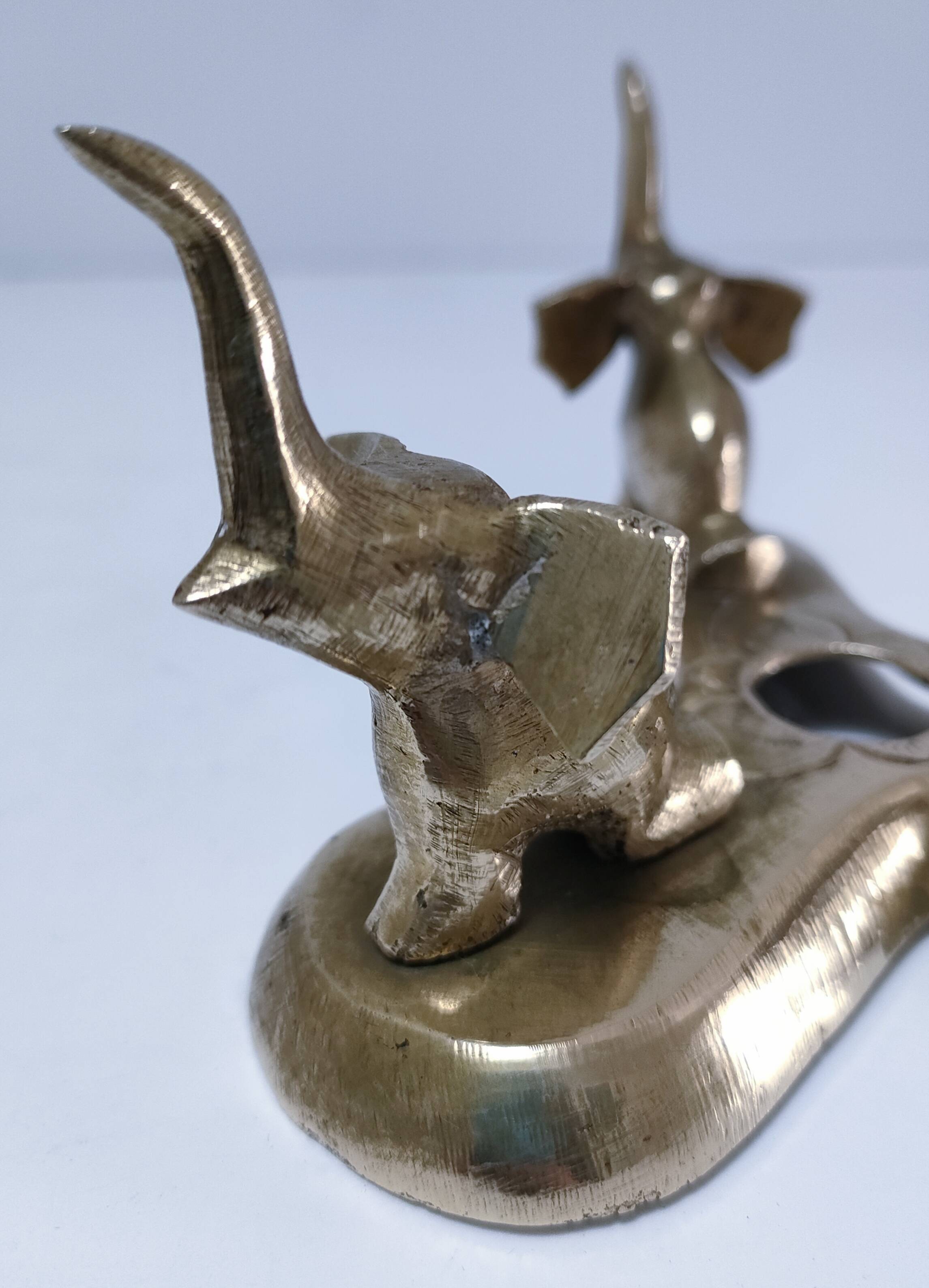 Solid brass elephant pocket emptier from the 80s