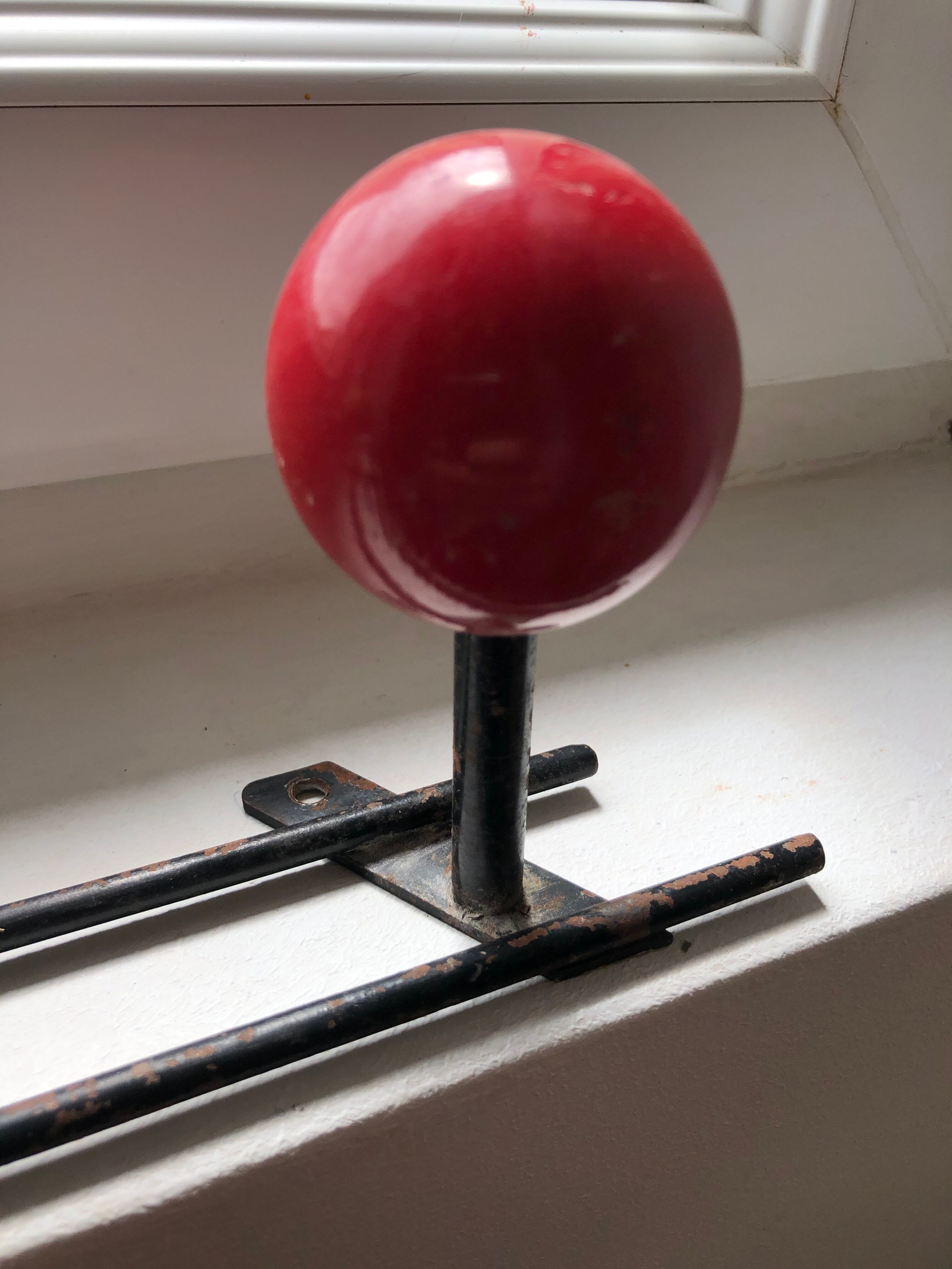 Patère two vintage balls wears old coat