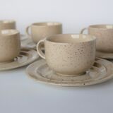 Coffee cup and vintage pyrity sandstone subcup