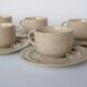 Coffee cup and vintage pyrity sandstone subcup