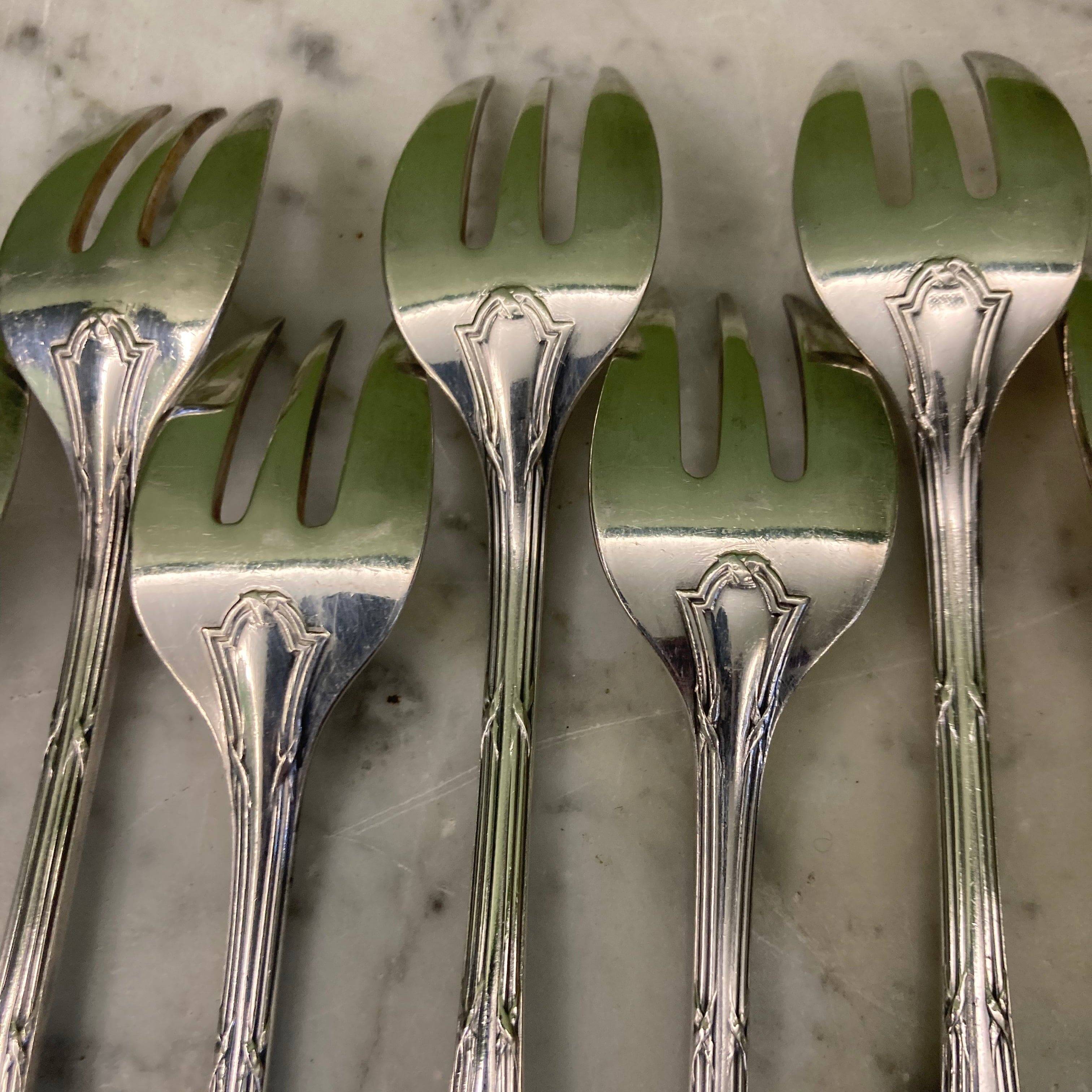 Christofle house 12 crossed ribbon oyster forks