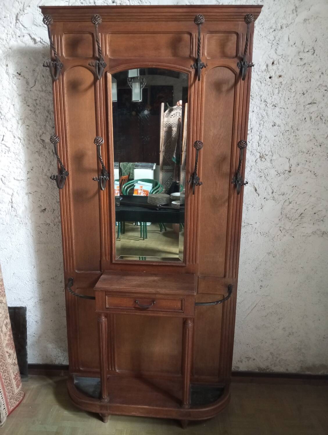 Oak and wrought iron coat rack from around 1900.