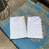 Two GC embroidered pillowcases