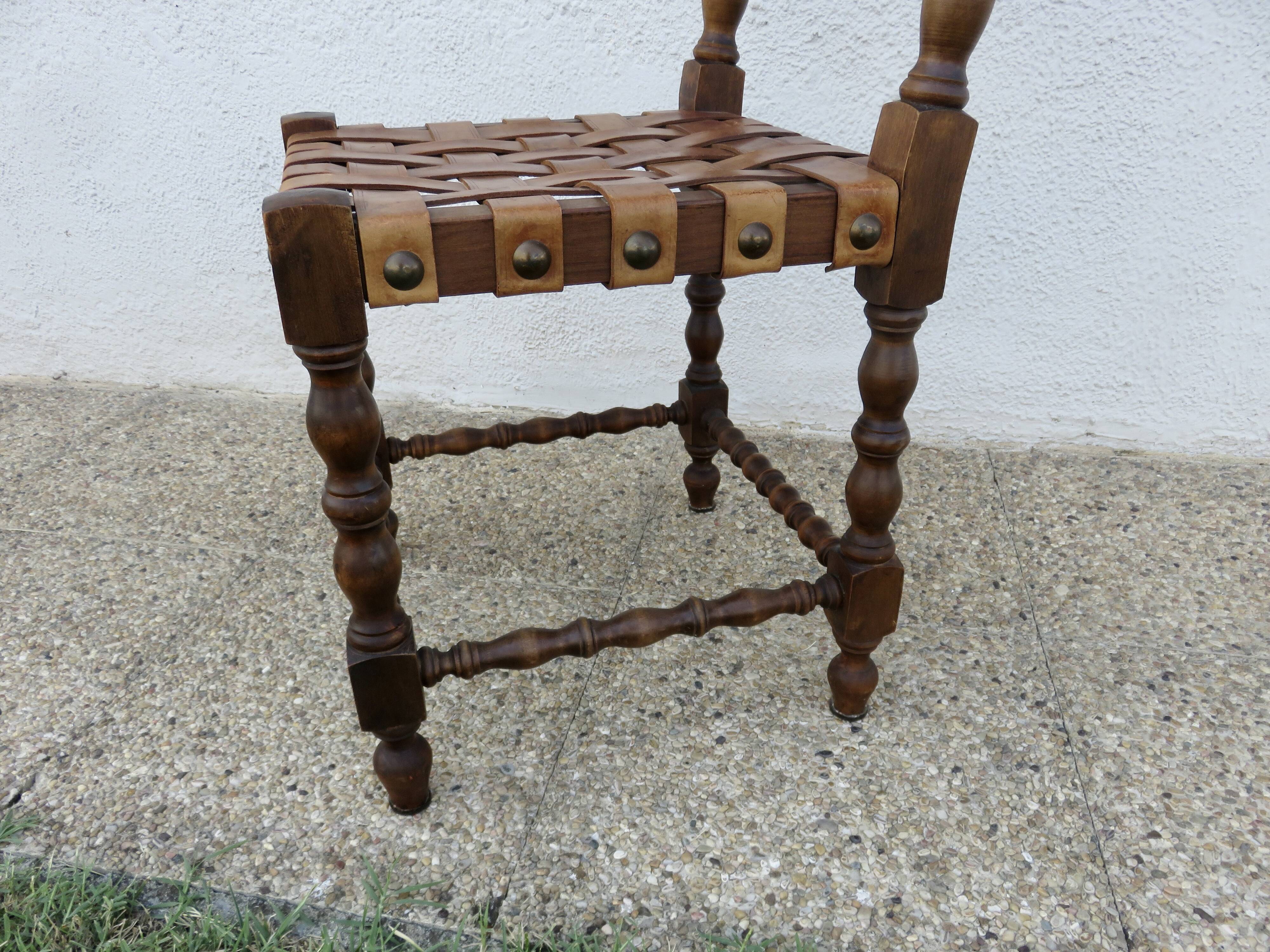 Spanish chair in oak with thick cognac leather straps, 1940s.