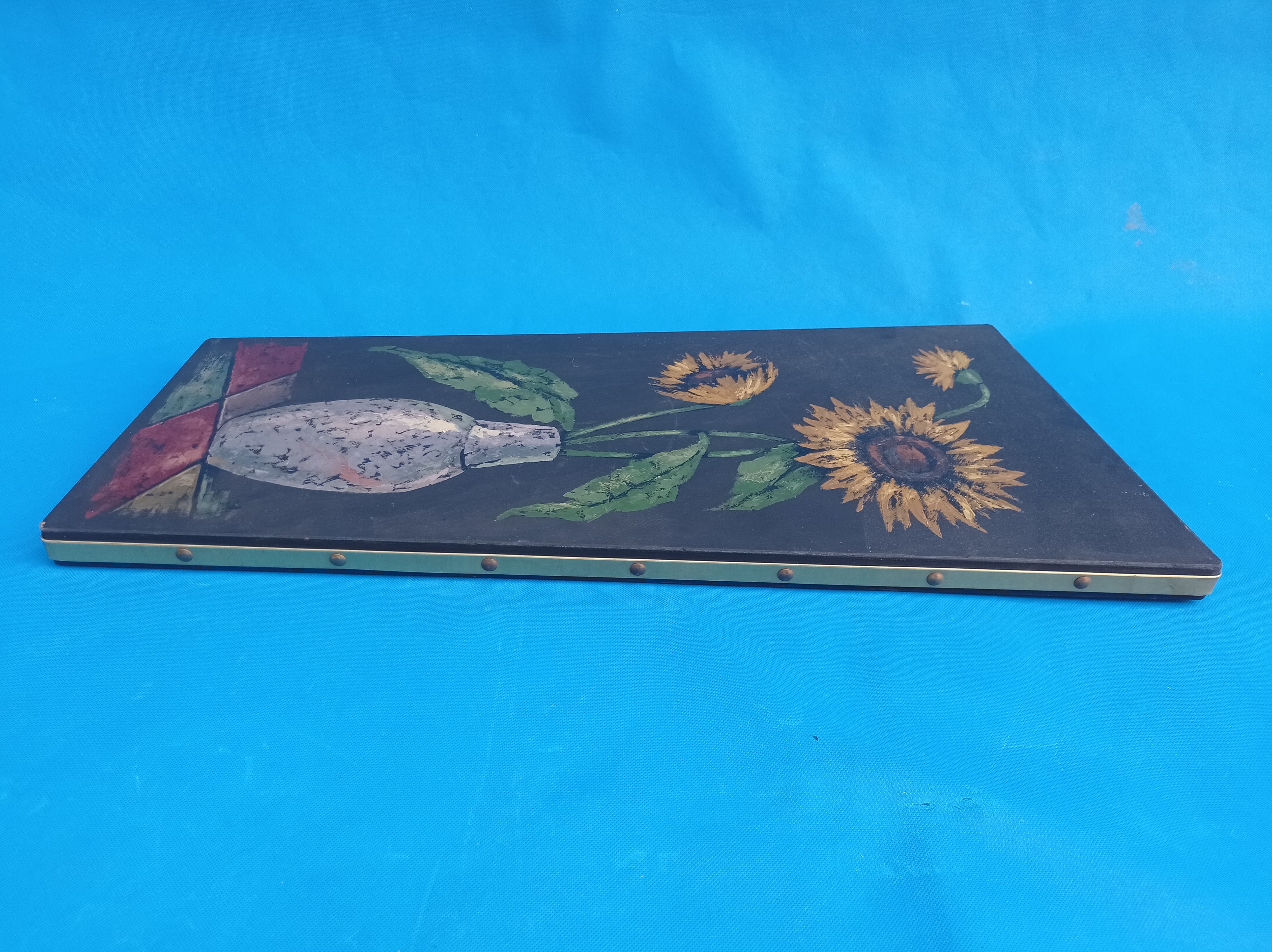 Painting of sunflowers in a vase comes from the 60's / 70's