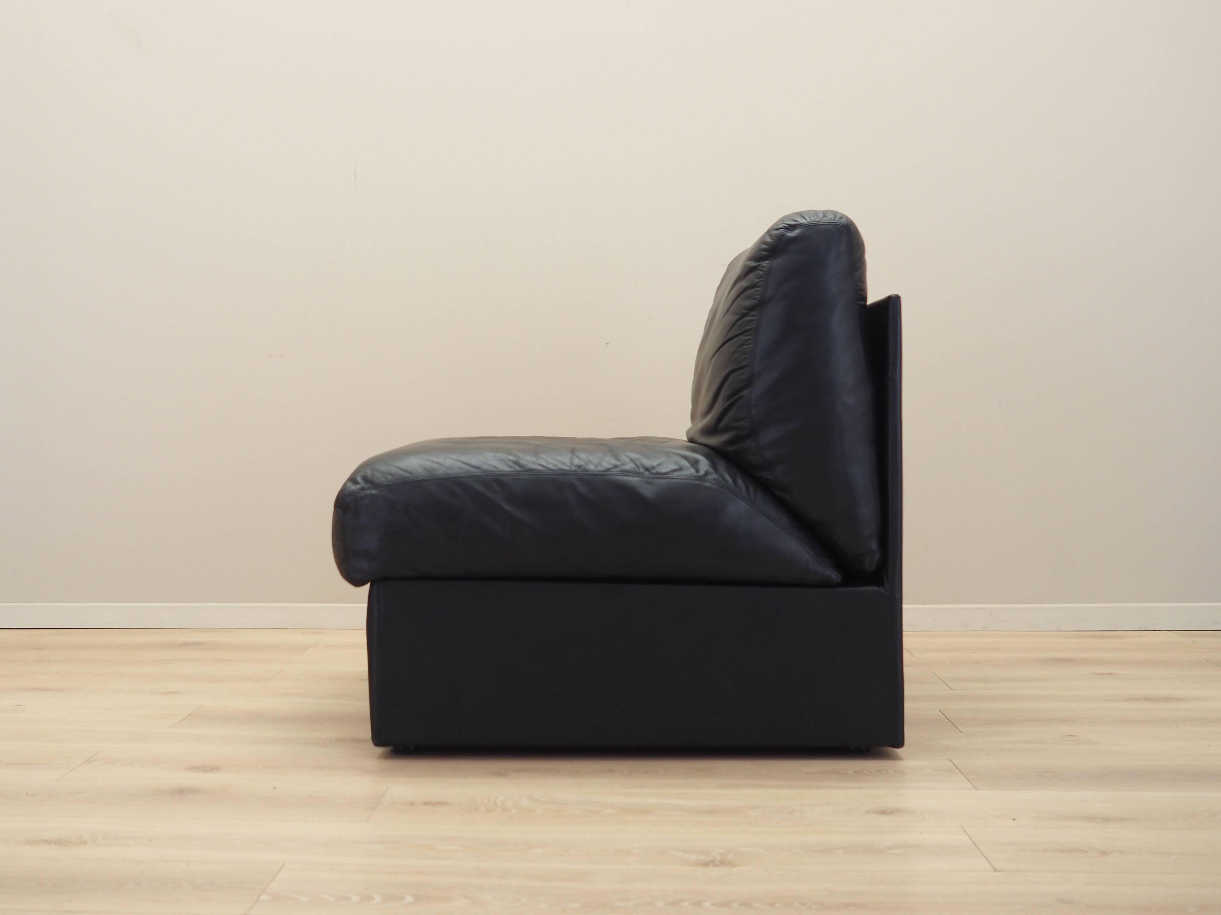 Black leather pouffe/armchair, Italian design, 1960s, production: Italy