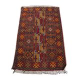 Antique oriental rug featuring orange details 135x81cm