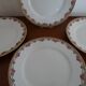 4 assiettes plates porcelaine Limoges Theodore Haviland motifs Art Deco Ø 24, cm