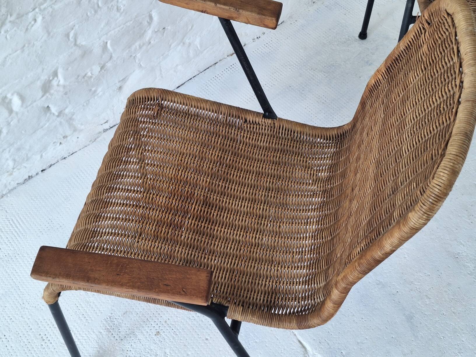 Pair of Swiss stackable rattan and iron dining elbow chairs, G Legler 1960s