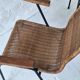 Pair of Swiss stackable rattan and iron dining elbow chairs, G Legler 1960s