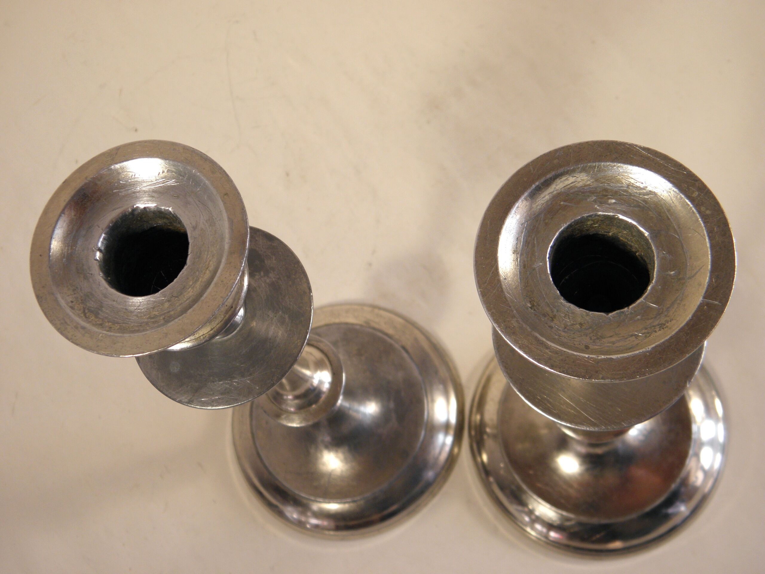 Pair of candlesticks in silver metal