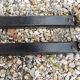 Old cast iron and xl brass andirons in neo classical style