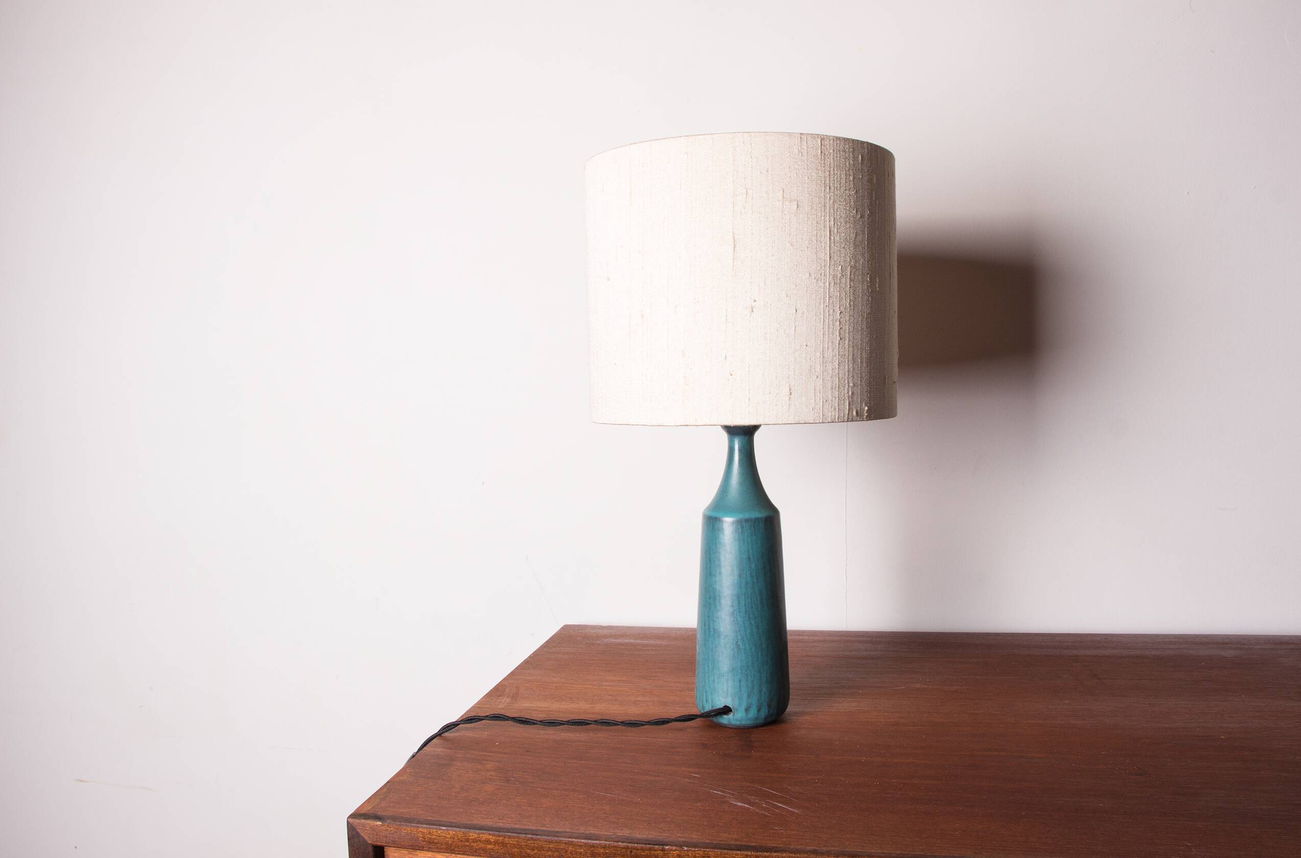 Danish truncated conical table lamp in matte blue sandstone by Gunnar Nylund for Nymolle 1960.