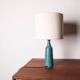 Danish truncated conical table lamp in matte blue sandstone by Gunnar Nylund for Nymolle 1960.