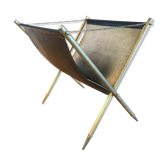 Wearing leather and brass magazines rack