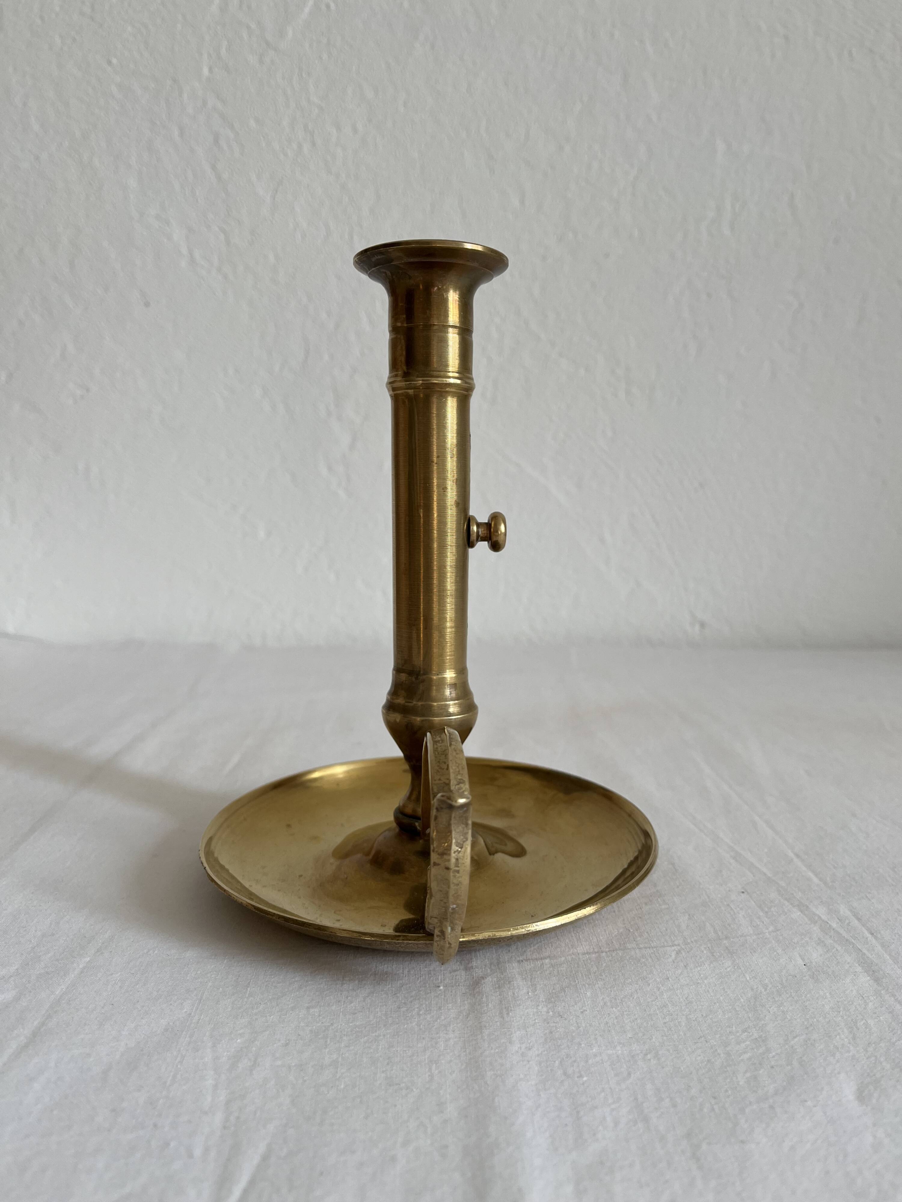 Vintage brass high hand candle holder
