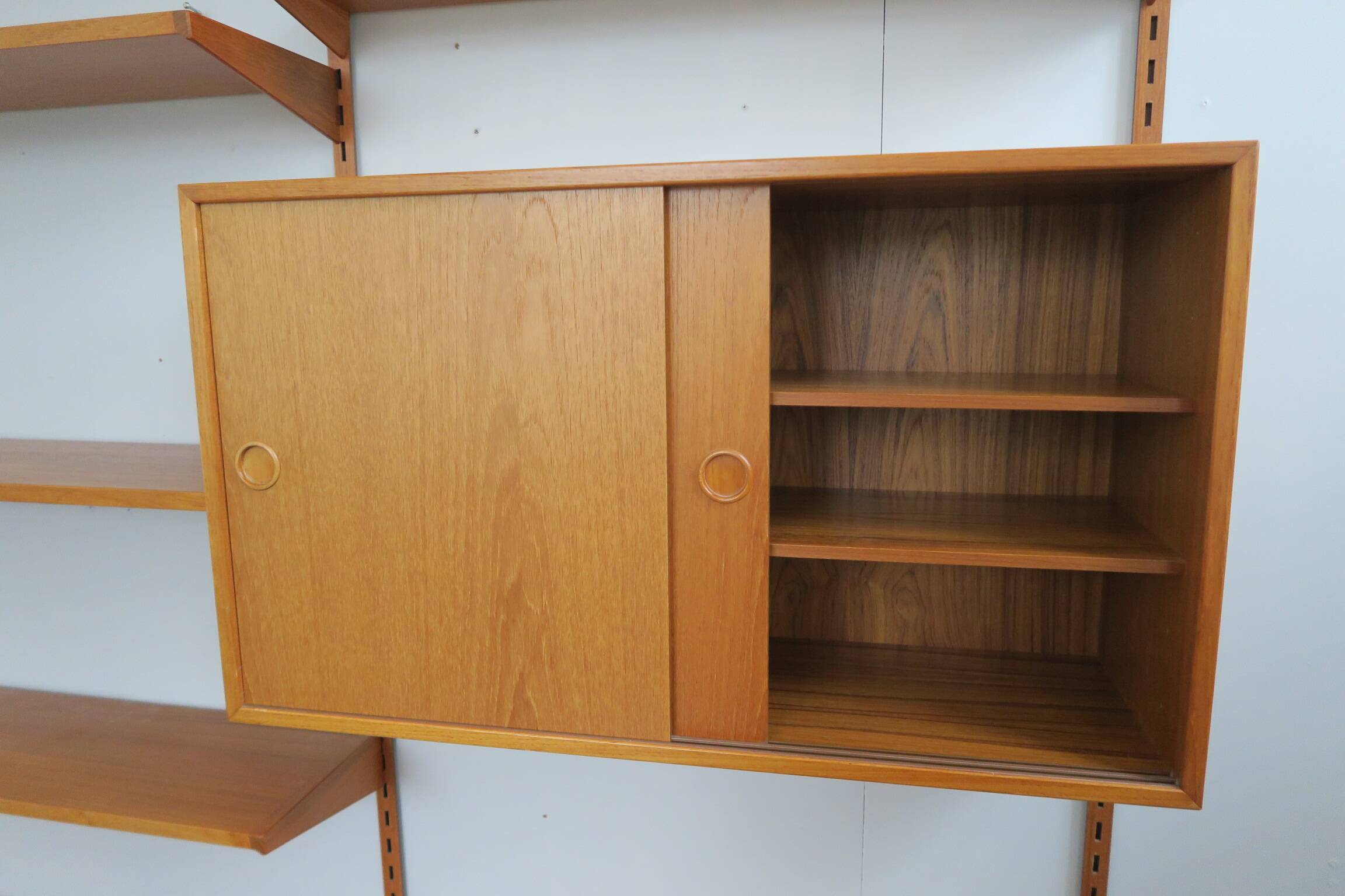 danish wall shelf unit in teak from the 60s by Kai Kristiansen