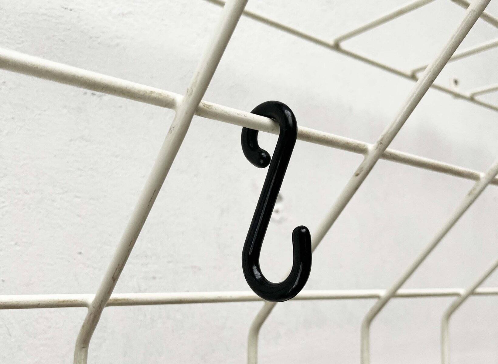 Minimalist white wire coat rack from mid-century Germany, 1960s.