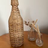 Bouteille en verre et rotin vintage
