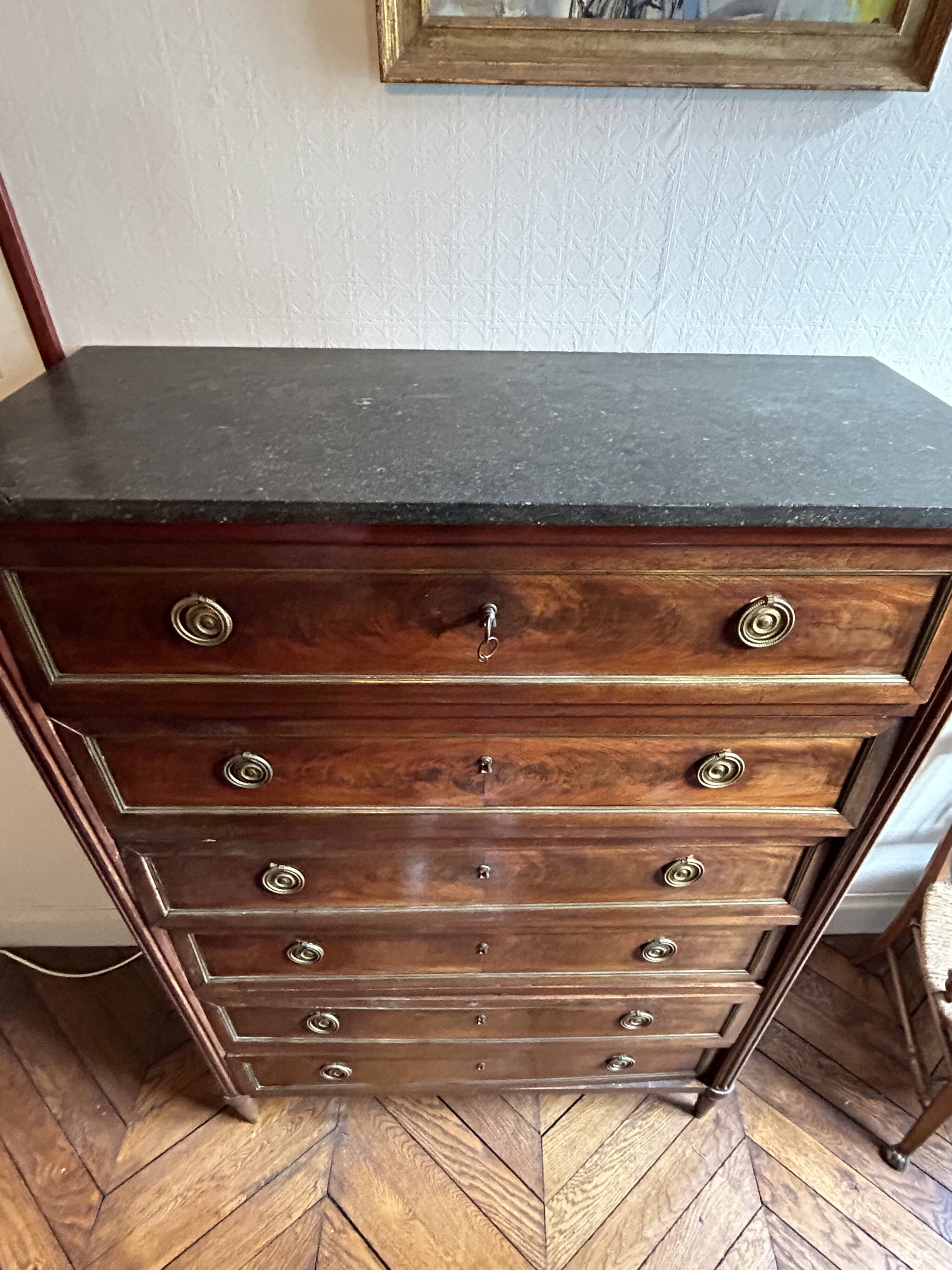 Mahogany and black marble chest of drawers, late 18th-early 19th century