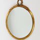 Round wall mirror in gilded wood, mid-century, C. Allodi & G. Subelli, Italy, 1950s.