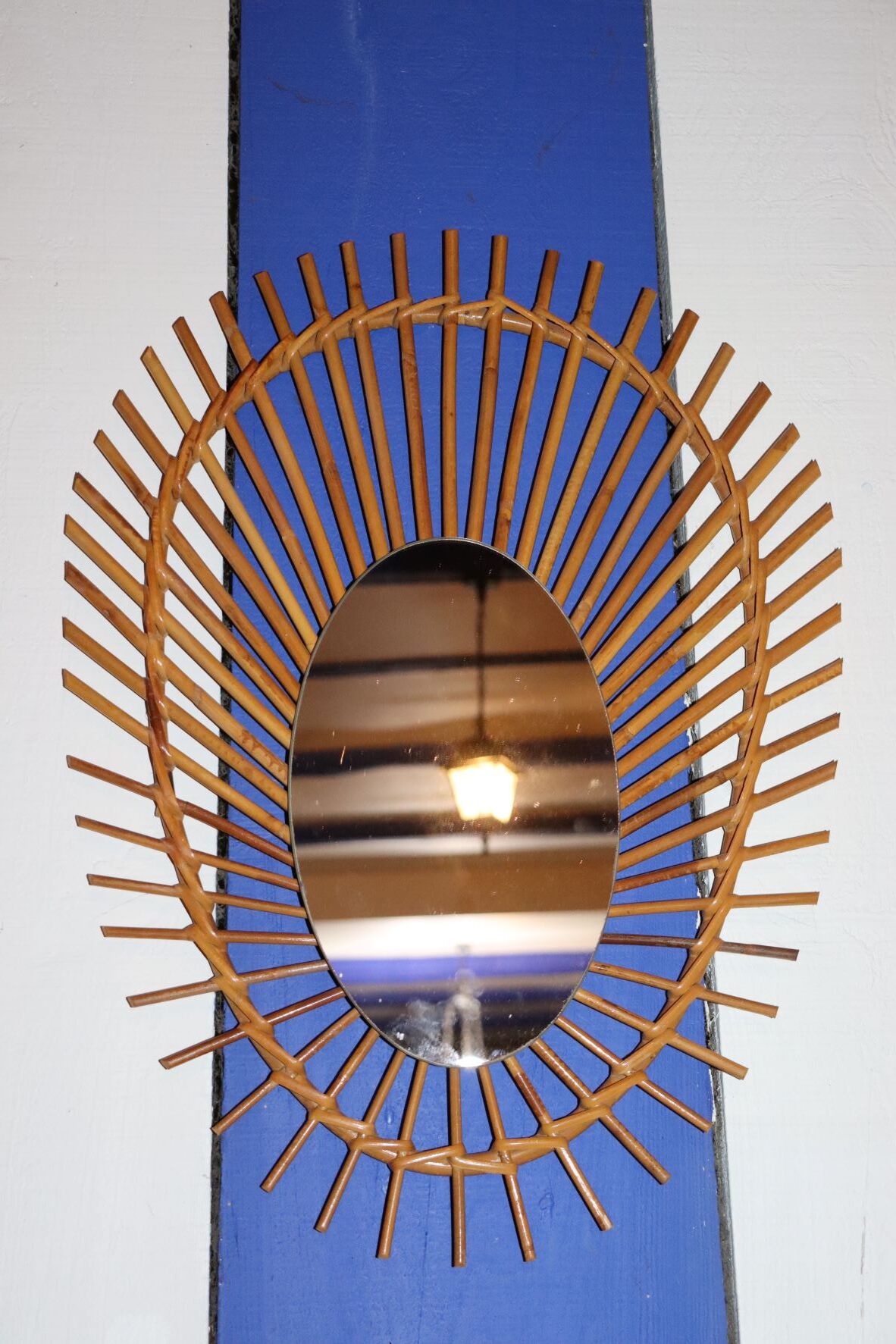 Oval rattan mirror
