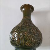 Small glazed vase with raised floral decoration