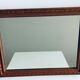 Antique mirror in carved wood and mercury 48x63cm