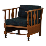 Art Nouveau, pair of oak lounge chairs, reupholstered in style fabric, 1920s.
