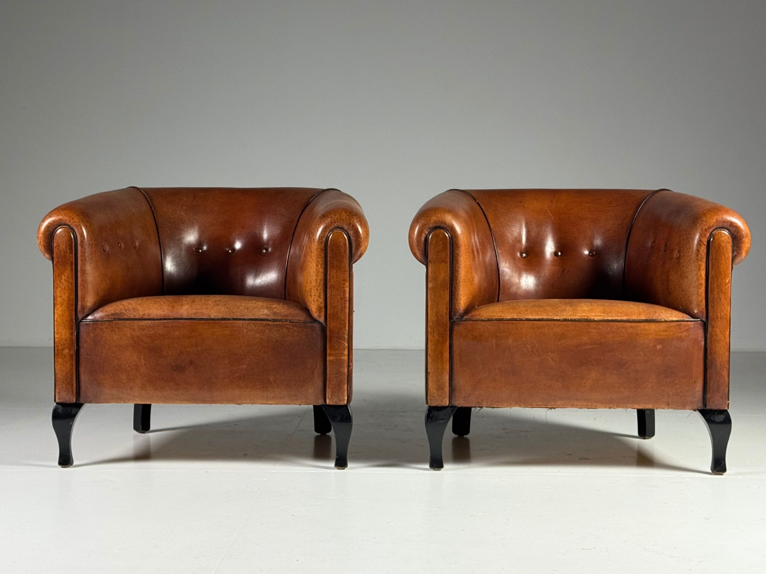 Ensemble de 2 fauteuils club en peau de mouton