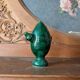 Decorative piece in green glazed stoneware, jug shape.