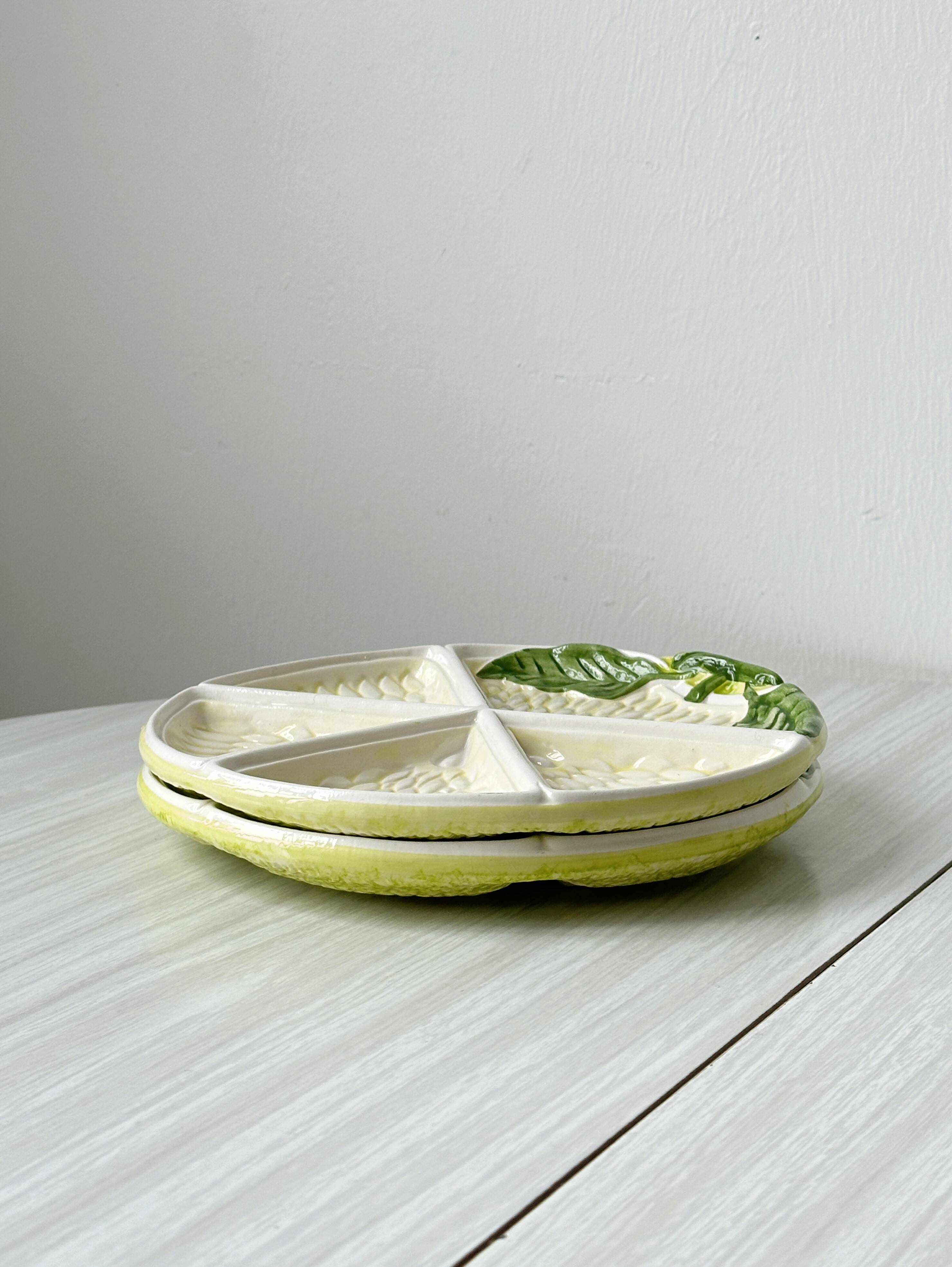 2 ceramic plates depicting a lemon