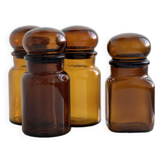 4 amber glass apothecary jars, Ariel advertising brand jars.
