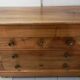 Empire style chest of drawers in blond walnut