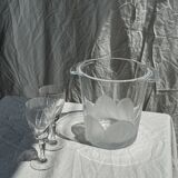 Glass ice or champagne bucket with stylized petal patterns