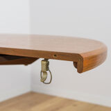 Mid-century round extendable teak dining table from McIntosh, United Kingdom, 1960s