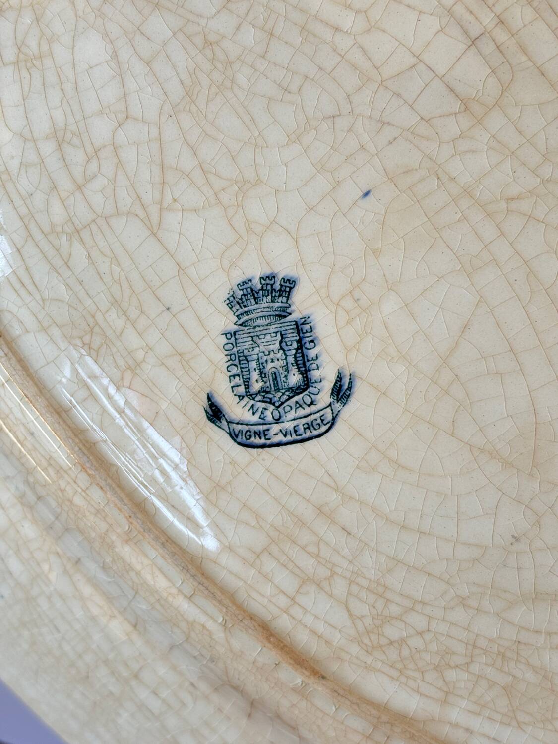 Large oval iron earth dish Gien