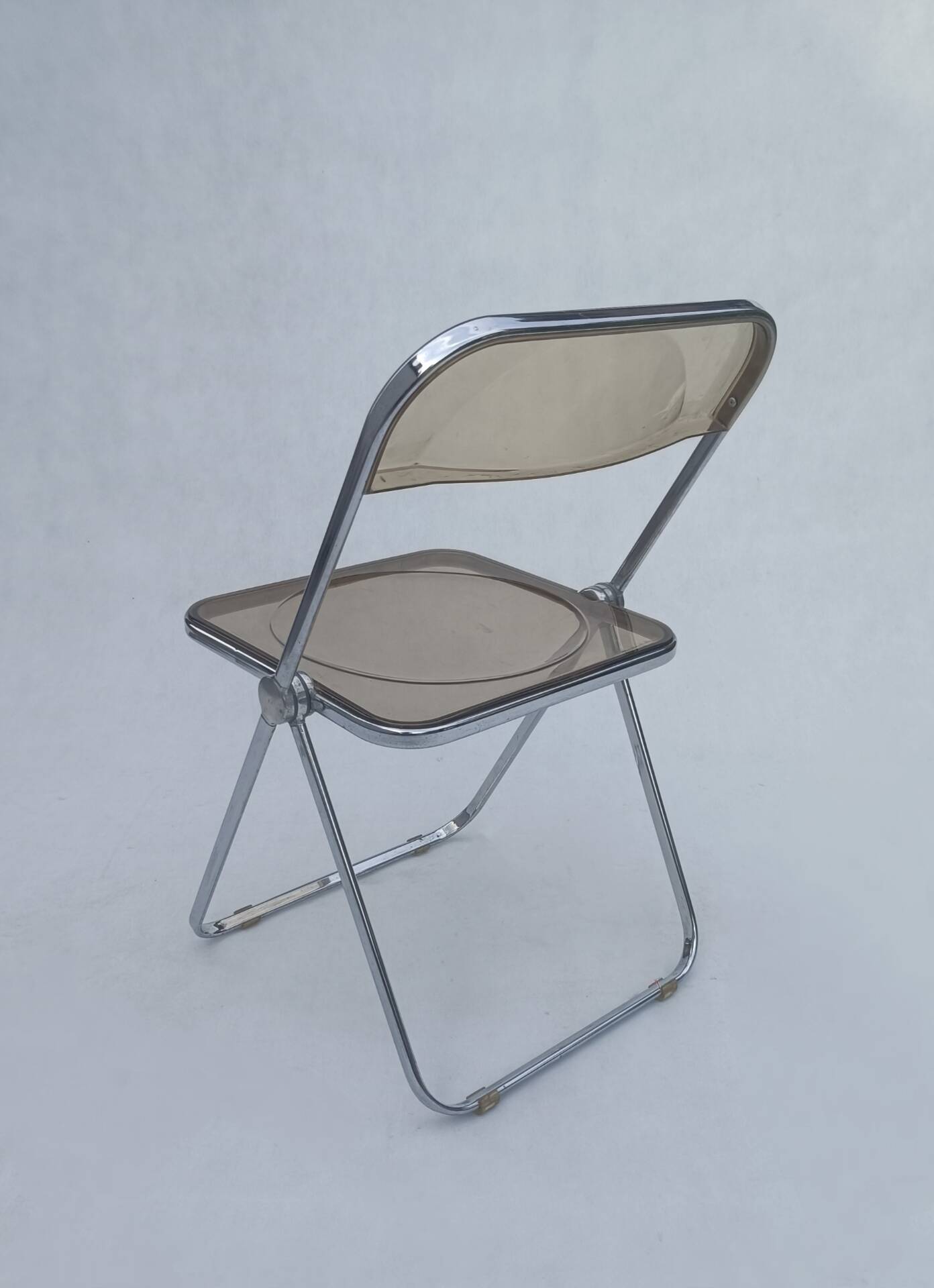 Plia folding chair by Giancarlo Piretti for Castelli