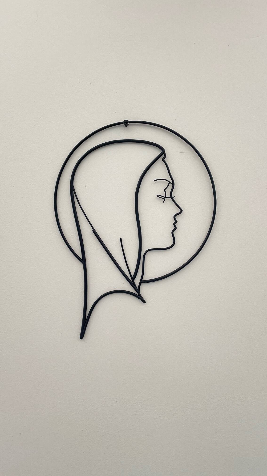 Vintage modernist wall decoration image of Saint.