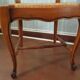 Table extensible et 4 chaises paillées, en merisier