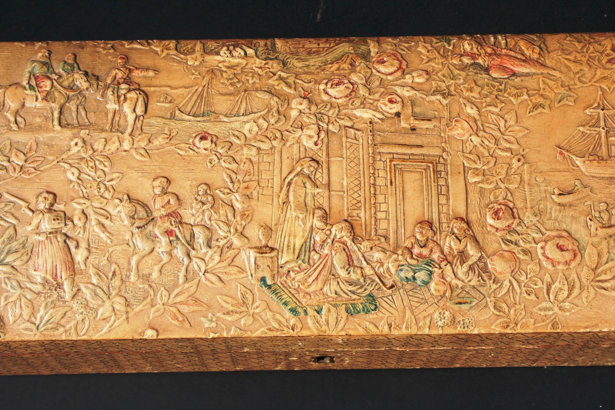 Old embossed leather glove box decorated scenes