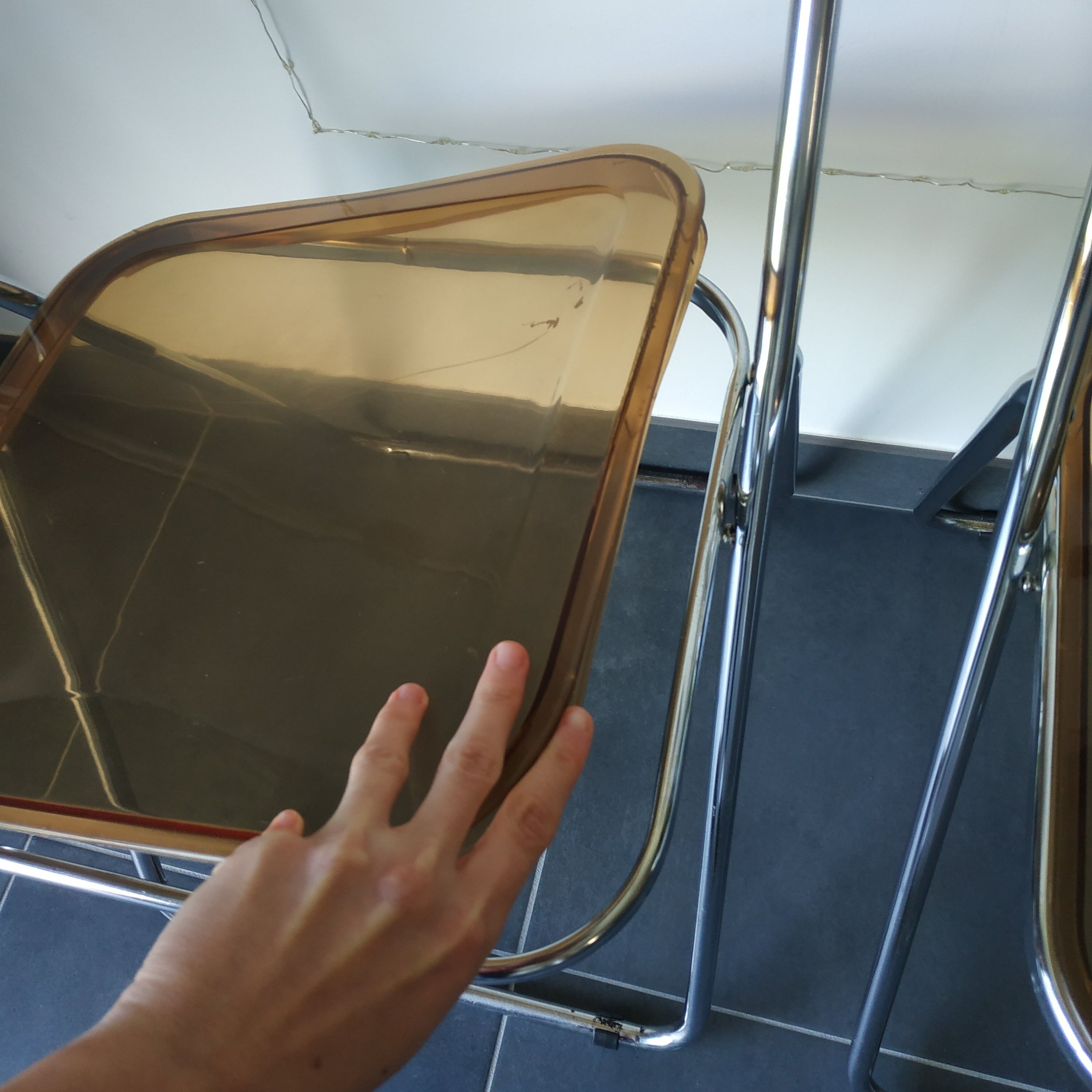 Seventies stainless steel and caramel chairs