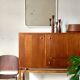 White tubular metal wall mirror