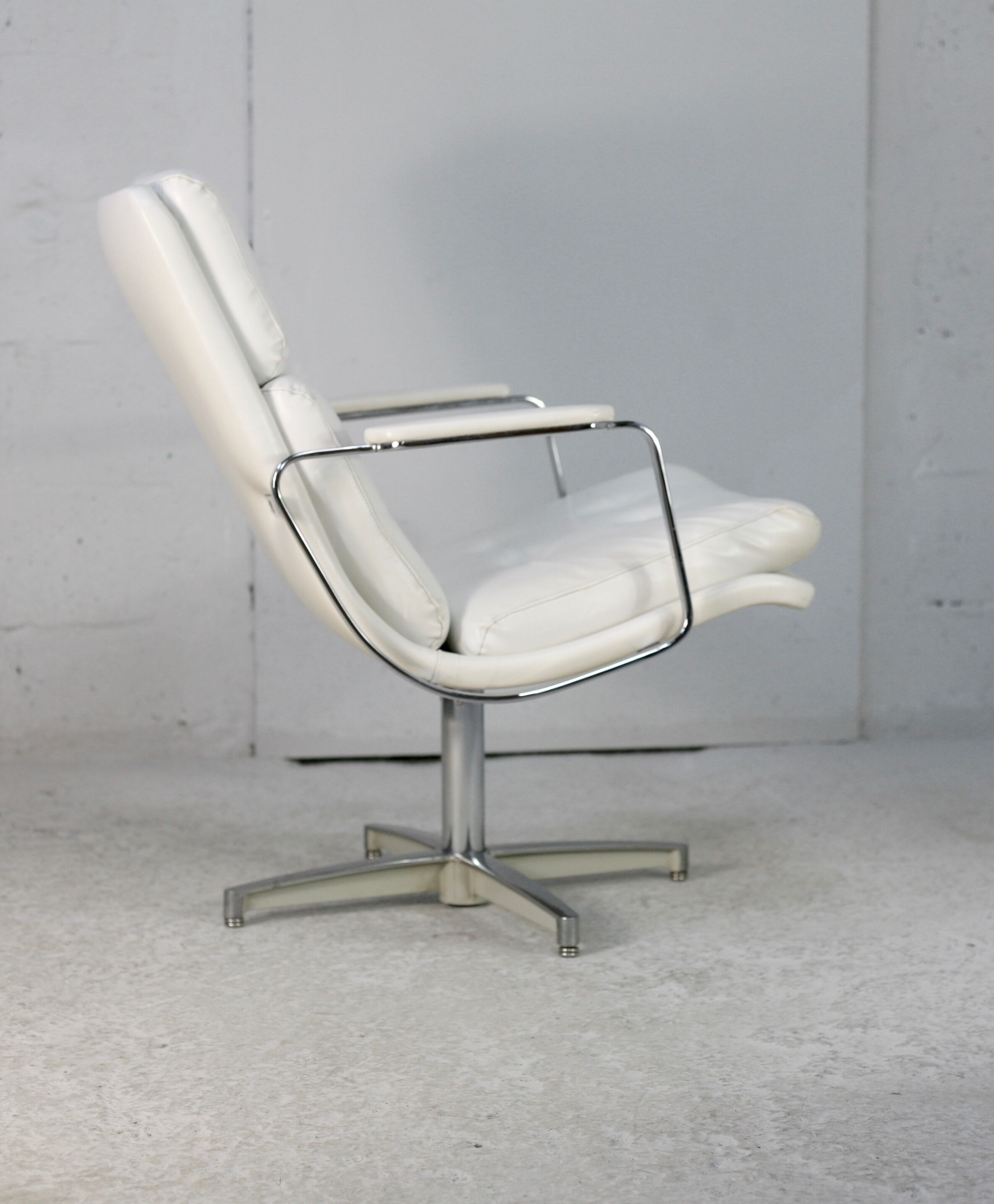 Armchair "Space Age"". Steel and imitation leather. Swivel. France, 70s