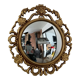 Ancient witch's eye mirror Dollanzo Italy in gilded wood