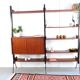 Vintage teak shelving system in 60s-70s style, retro style.